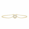 Gold bracelet with a circular design on a white background