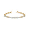 Gold bracelet with diamonds on a white background