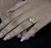 Close-up of a hand wearing a diamond ring