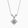 A cushion cut diamond pendant with a colorless stone set in a white gold or silver setting, suspended from a chain.