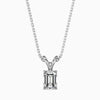 An emerald cut diamond pendant with a colorless stone set in a white gold chain.