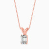 Rose gold necklace with a diamond pendant on a white background