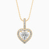 Heart-shaped diamond pendant on a gold chain on a white background