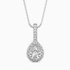 A pear cut halo pendant with a diamond encrusted setting on a white background.