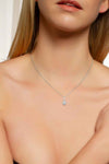 Necklace with a pendant worn by a model