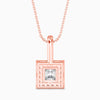 Rose gold pendant with a diamond on a white background