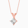 Rose gold necklace with a diamond pendant on a white background