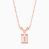 Rose gold necklace with a pendant on a white background