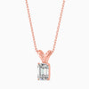 Rose gold necklace with a diamond pendant on a white background