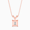 Rose gold necklace with a diamond pendant on a white background