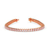 Rose gold bracelet with diamonds on a white background