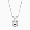 Silver necklace with a round pendant on a white background