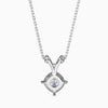 Silver necklace with a heart-shaped diamond pendant on a white background