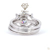 Silver ring with a gemstone on a white background, featuring the Cheriva Jewels logo.