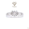 White gold engagement ring with a central lab-grown diamond surrounded by a sparkling halo setting