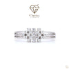 White gold engagement ring with a central lab-grown diamond surrounded by a sparkling halo setting