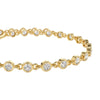 Gold bracelet with embedded diamonds on a white background