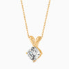 Gold necklace with a diamond pendant on a white background