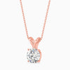 Rose gold necklace with a diamond pendant on a white background