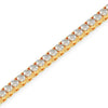 Gold bracelet with clear gemstones on a white background