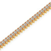 Gold bracelet with clear diamond on a white background