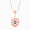 Rose gold pendant necklace with a clear gemstone on a white background
