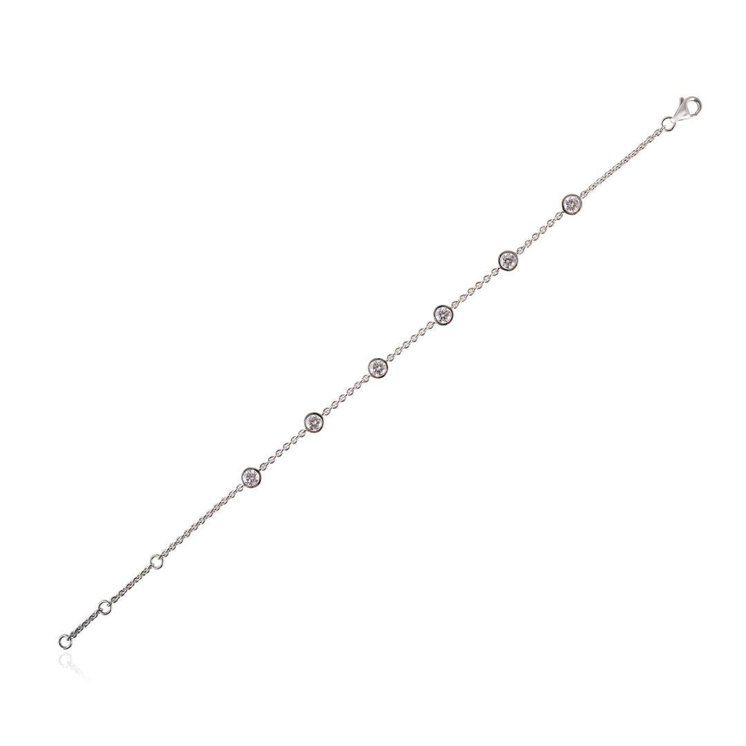 Silver bracelet with small diamonds on a white background