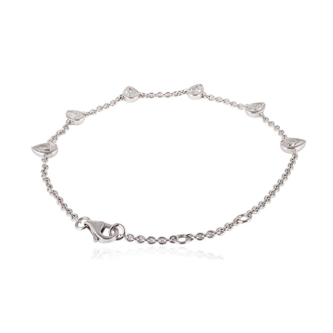 Silver bracelet with charms on a white background