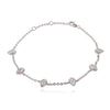 Silver bracelet with heart-shaped diamond a white background