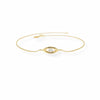 Gold bracelet with a Evil eye design on a white background