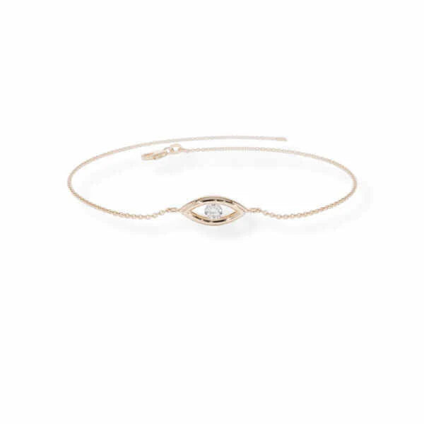 Rose gold bracelet with eye-shaped clasp on a white background