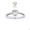 Silver ring with a gemstone on a white background, featuring the Cheriva Jewels logo.