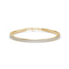Gold bracelet with diamonds on a white background
