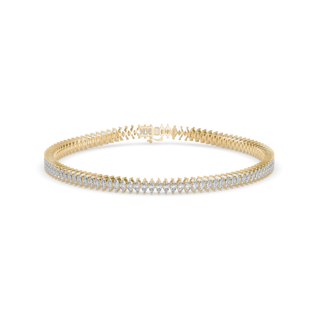 Gold bracelet with diamonds on a white background