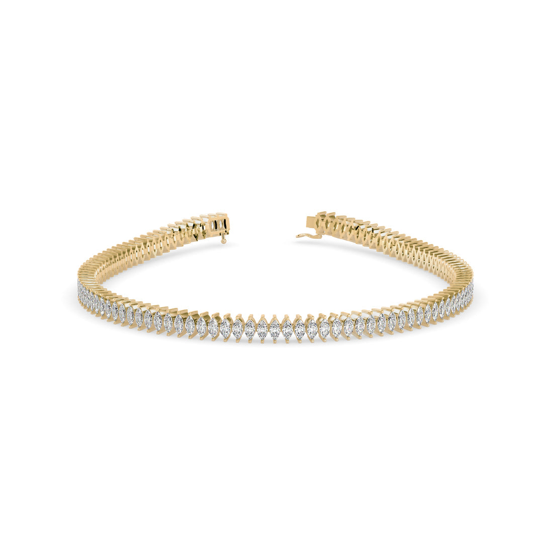 Gold bracelet with diamonds on a white background