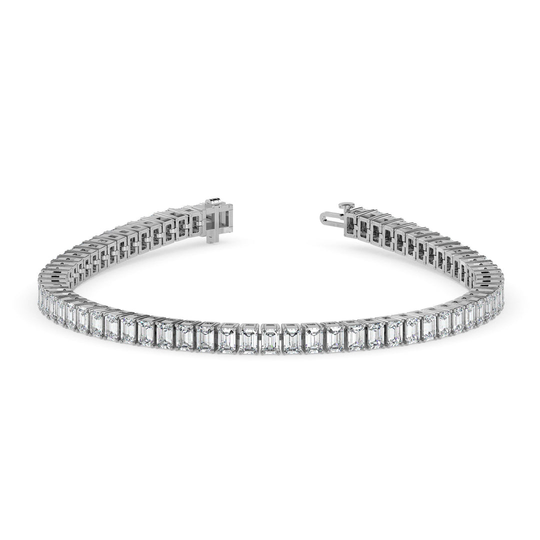 Diamond bracelet with emerald-cut stones on a white background