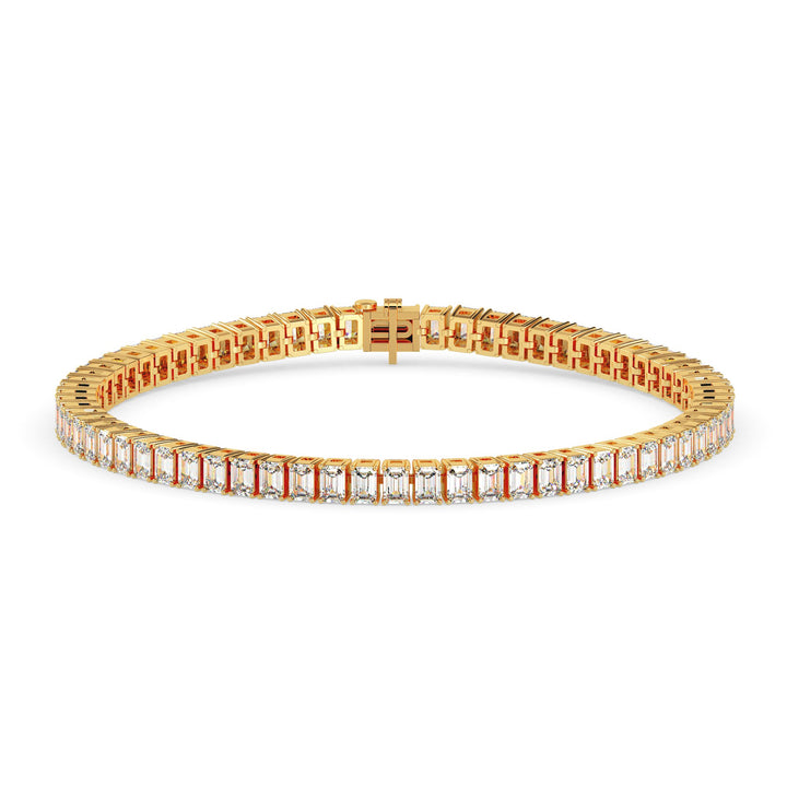 Gold bracelet with diamond accents on a white background