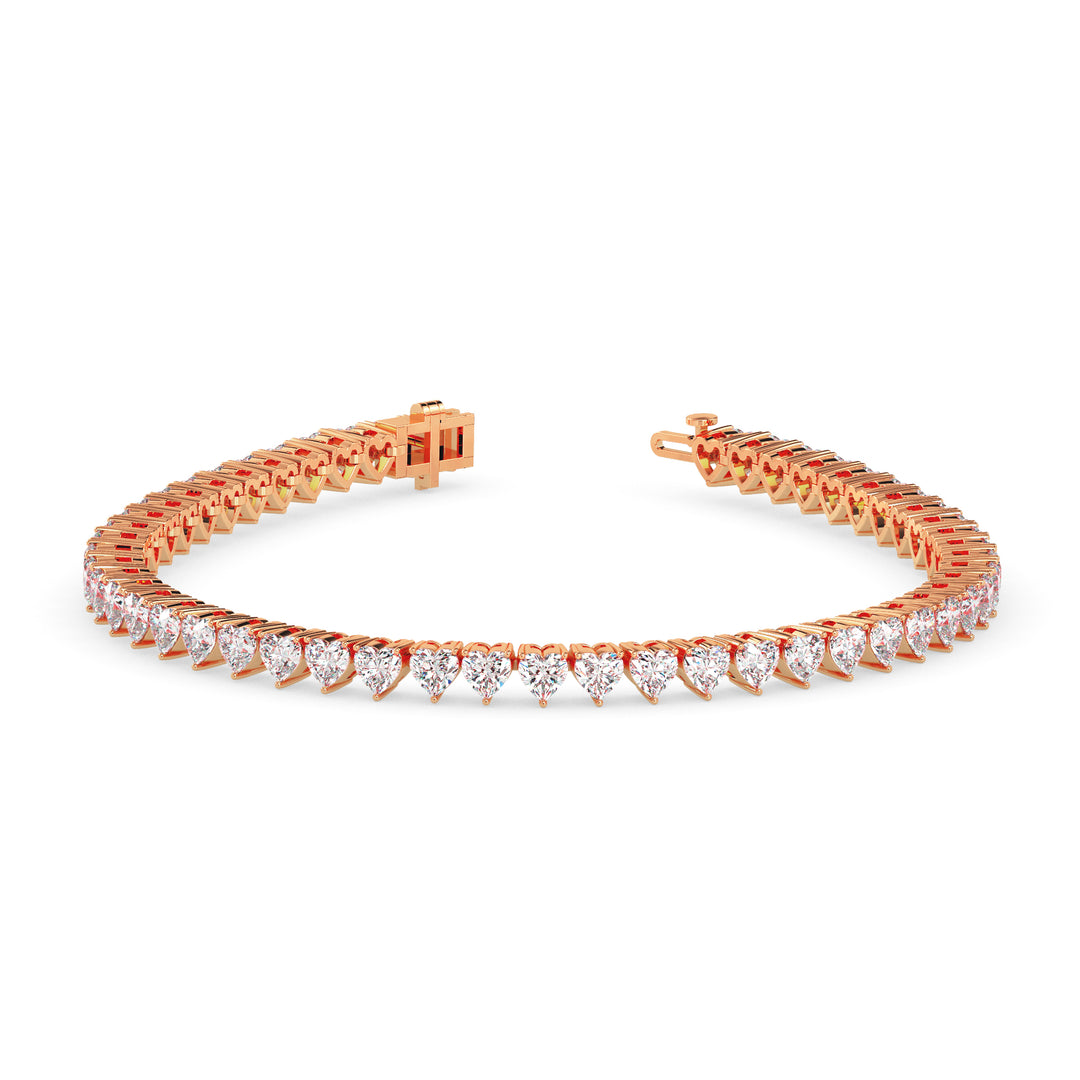Rose gold bracelet with diamonds on a white background