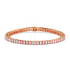 Rose gold bracelet with clear gemstones on a white background
