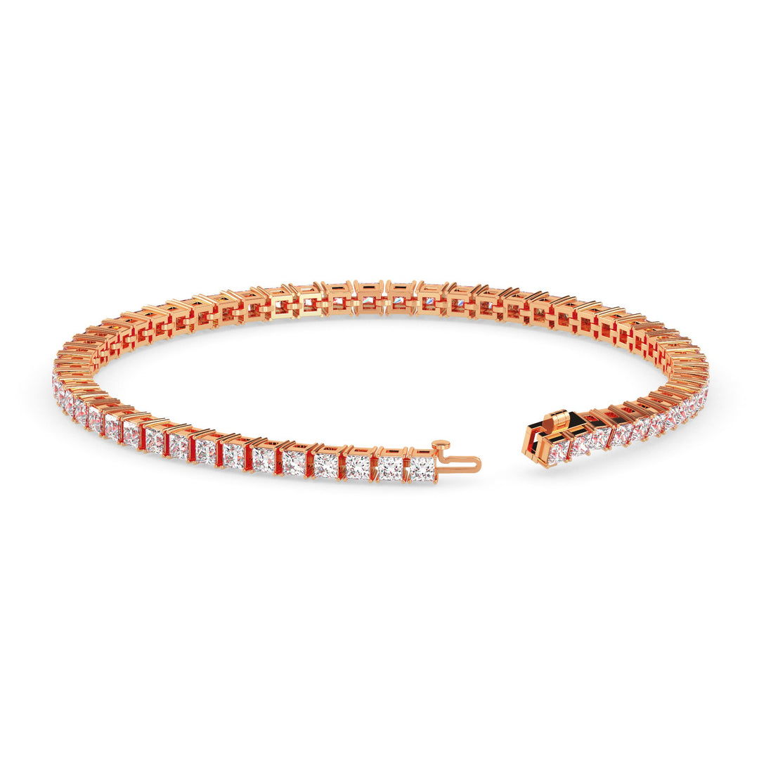 Rose gold bracelet with diamond accents on a white background