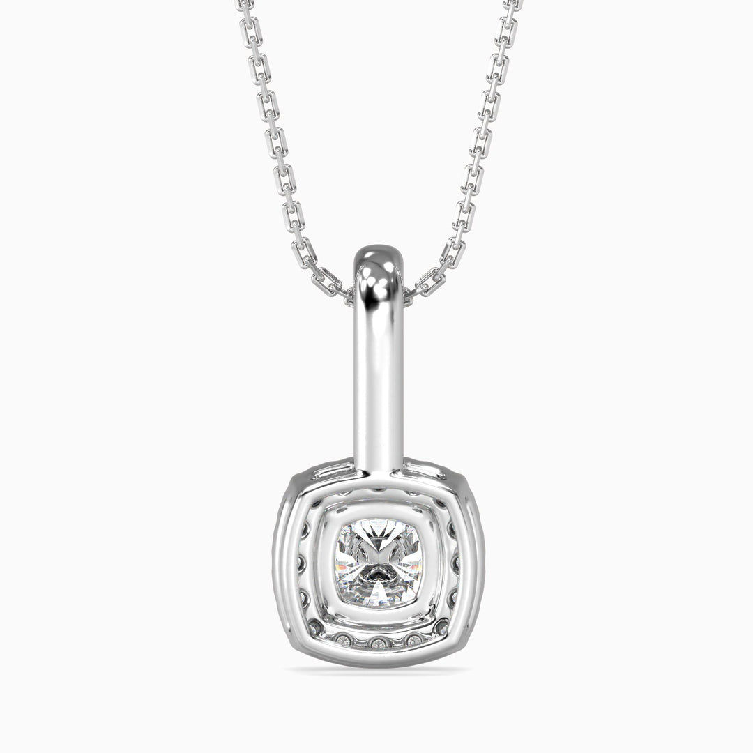 Silver pendant necklace with a clear gemstone on a white background