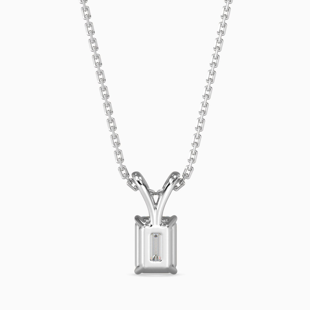 Silver necklace with a rectangular pendant on a white background