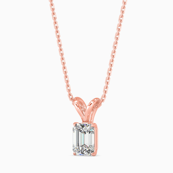 Rose gold necklace with a diamond pendant on a white background