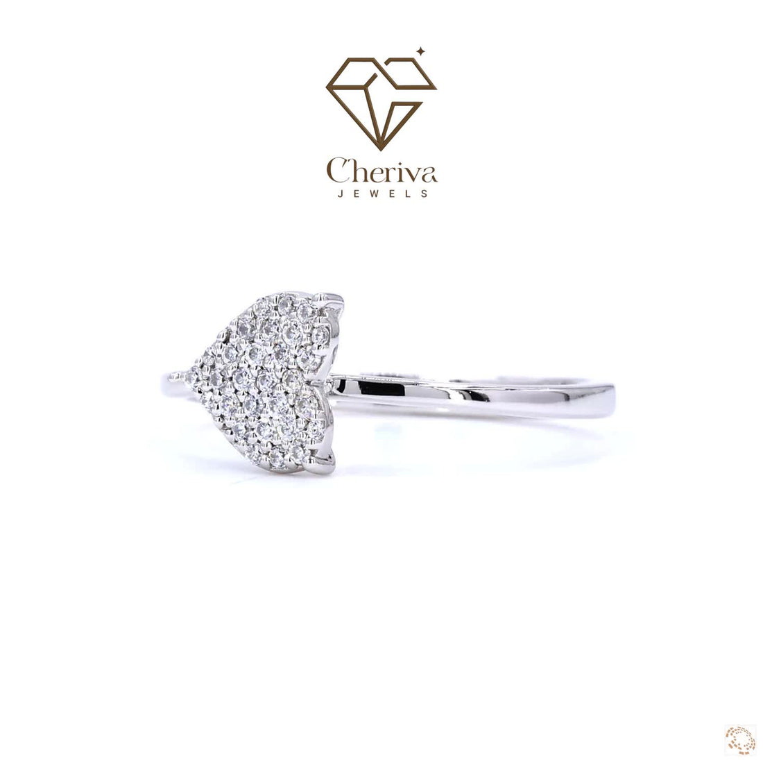 Silver ring with heart-shaped diamond design on a white background, featuring Cheriva Jewels logo.
