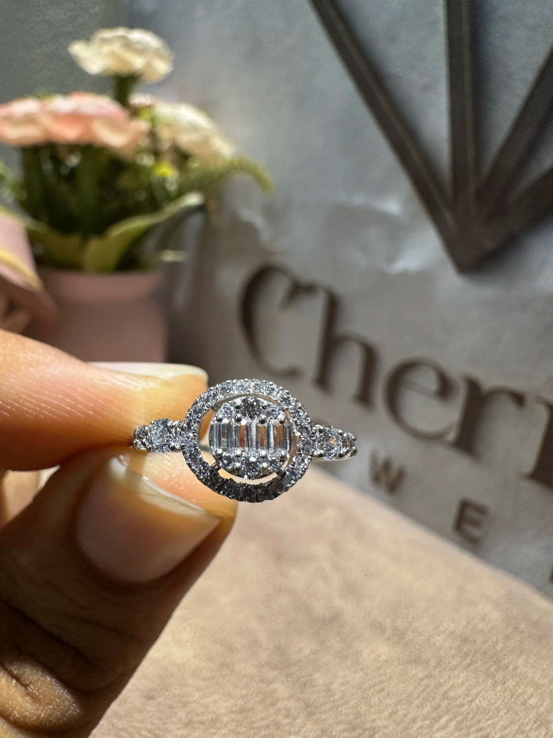 Halo Engagement Ring With Baguette Cut Diamond