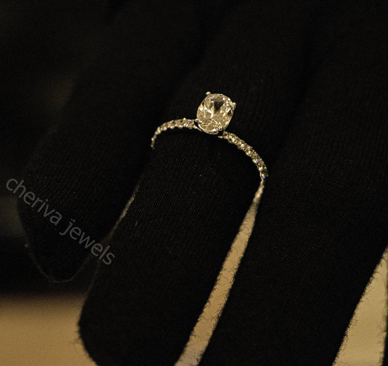 Solitaire Accent Engagement Ring in Oval Cut Diamond