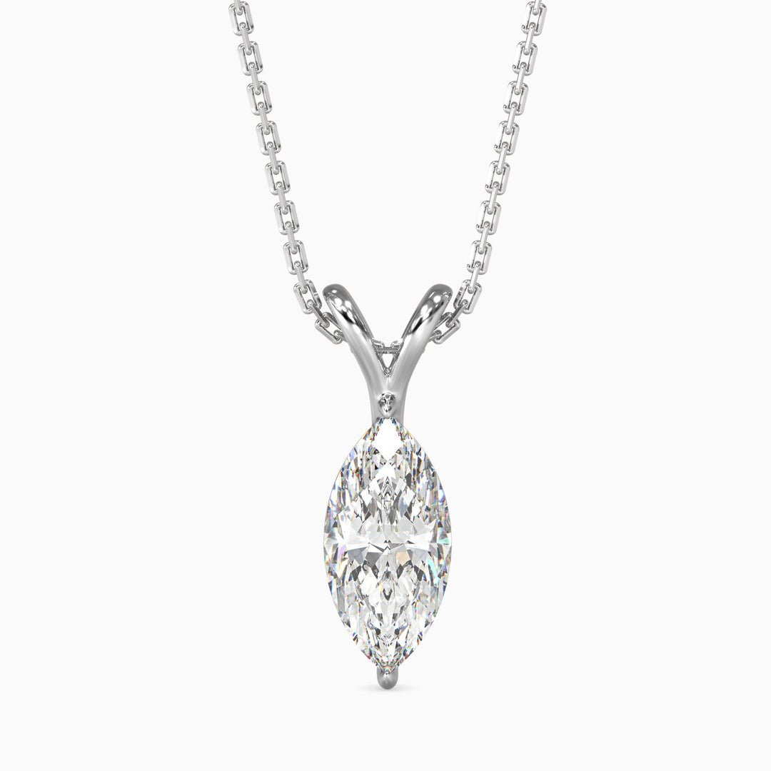 A marquise cut diamond pendant with a colorless stone set in a white gold chain.