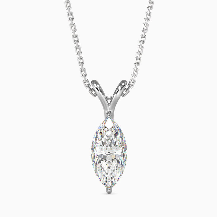 A marquise cut diamond pendant with a colorless stone set in a white gold chain.