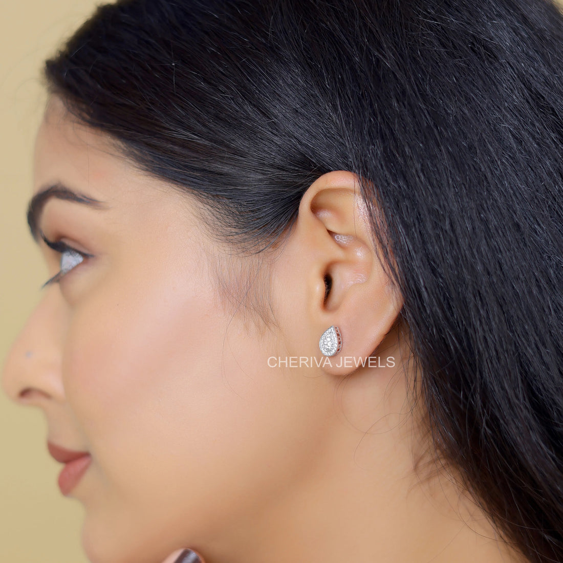 Round Cut Halo Stud Earring in Pear Shape