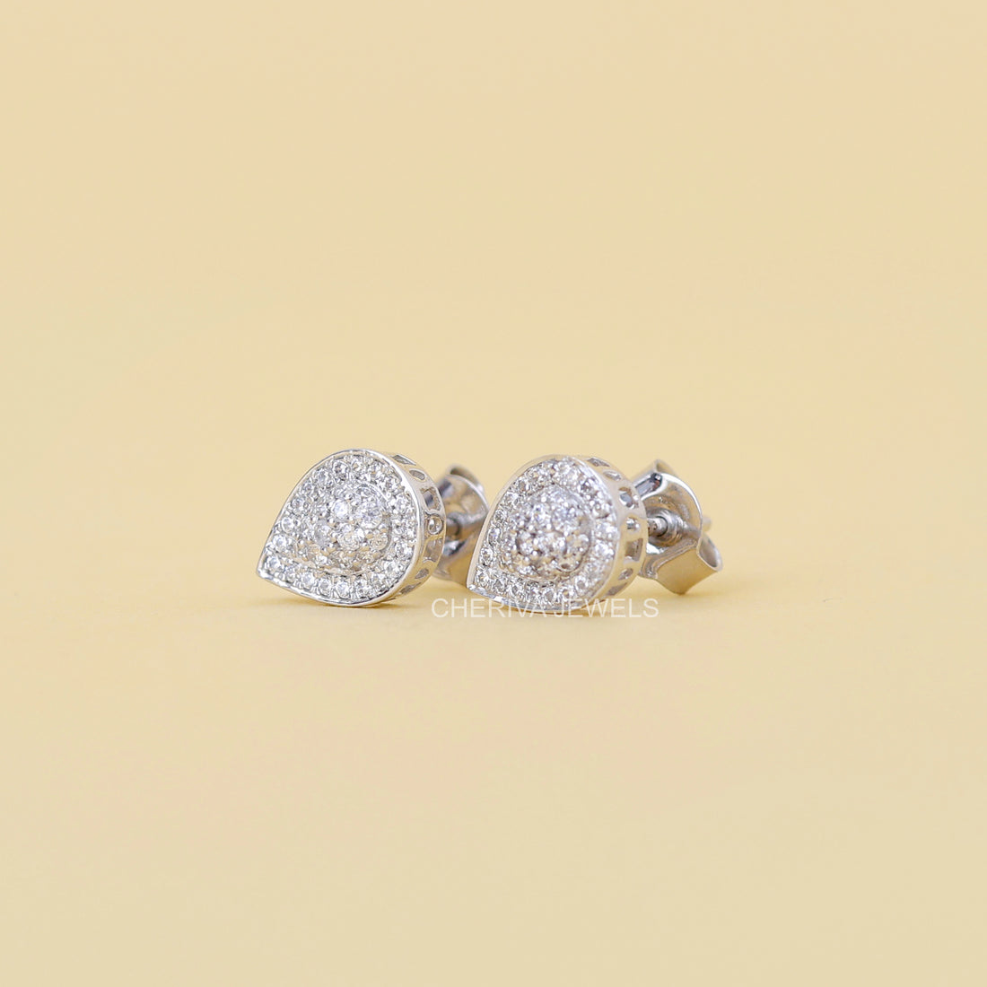 Round Cut Halo Stud Earring in Pear Shape